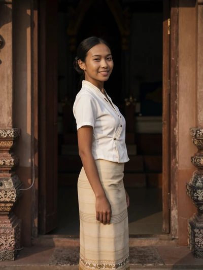 Boupha, 29, Laos - Tourism guide at UNESCO heritage sites. Speaks English and French. Passionate about preserving Lao cultural traditions for future generations.