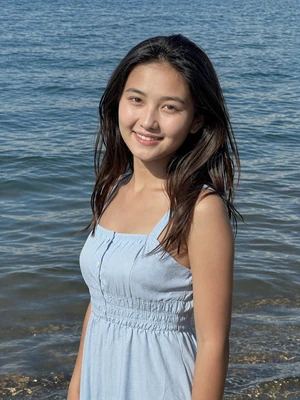 Aidai, 23, Kyrgyzstan - Hospitality management student who dreams of opening a lakeside guesthouse. Enjoys swimming in Issyk-Kul and baking traditional boorsok.