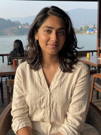 Anisha, 29, Nepal - University lecturer passionate about Nepali literature and mountain photography. Values honesty, warmth, and meaningful conversations.